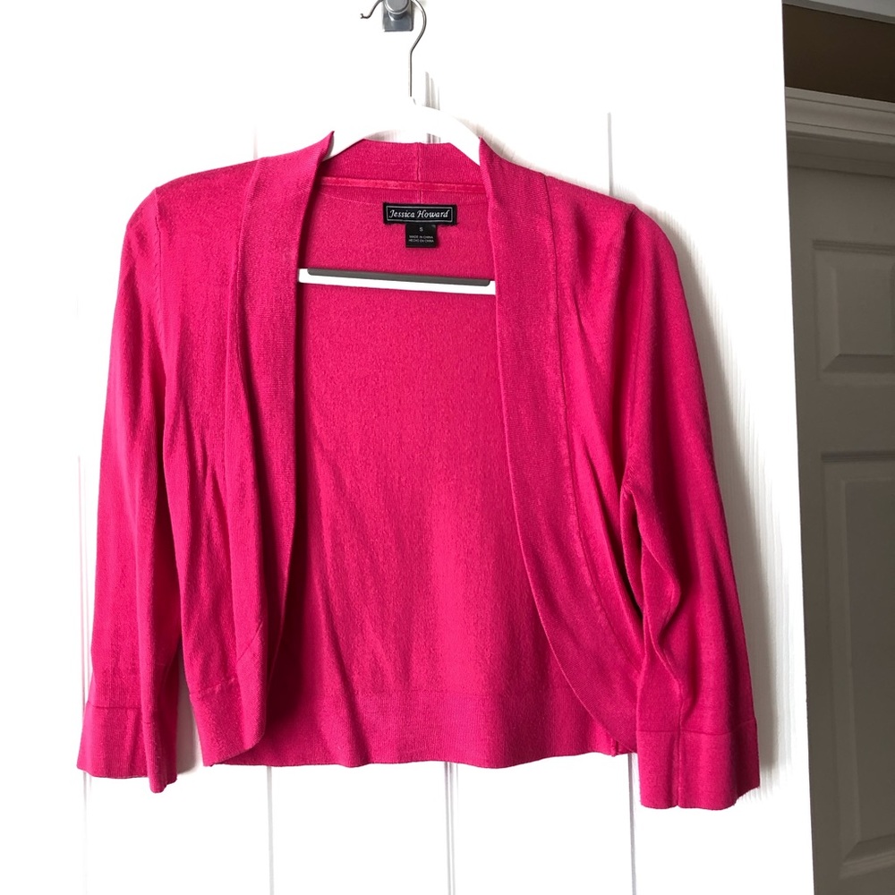 Pink open front cardigan.